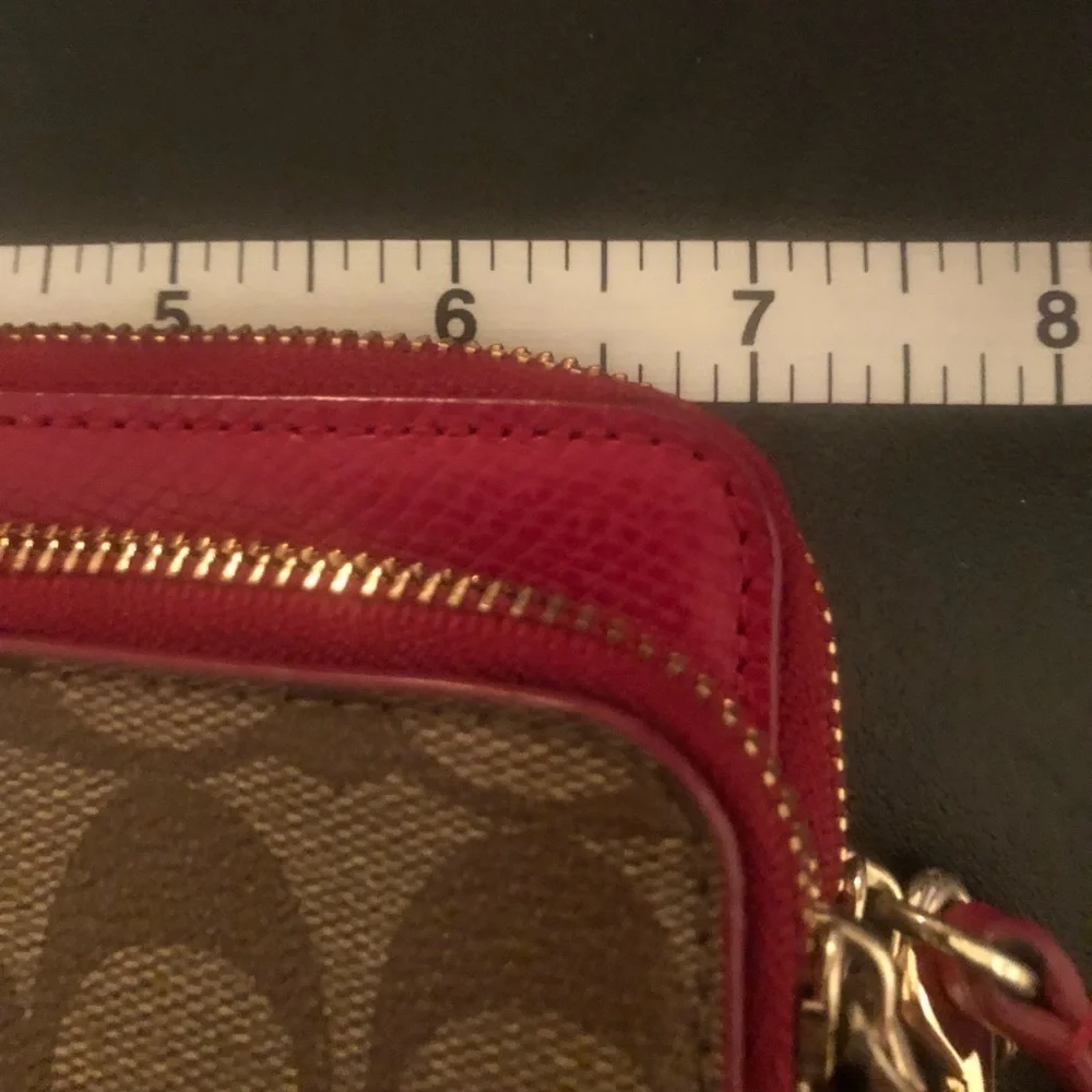 Coach red monogram large zip accordion style wallet with wrist strap